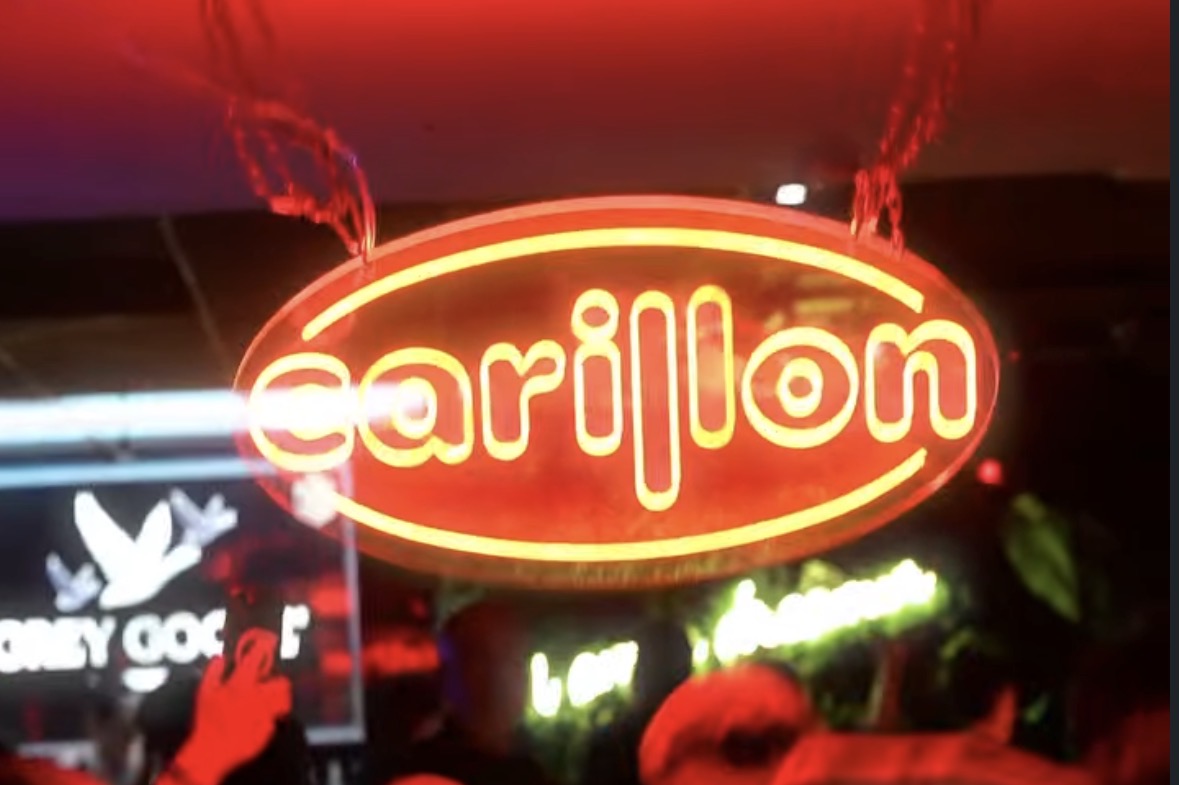 Close-up of the CARILLON neon sign